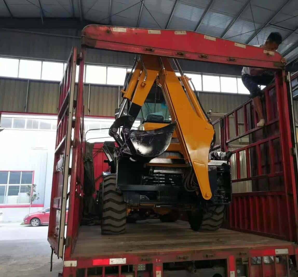Backhoe excavator packing and loading