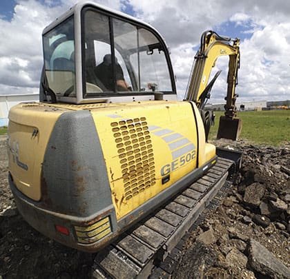 micro digger digging trenches